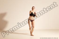 Underwear Martial art Woman White Moving poses Average long colored Dynamic poses Academic